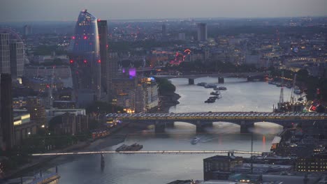 London-city-centre-shot-from-Sky-Garden,-cinematic-static-view-of-Thames-river-with-bridges-and-boats