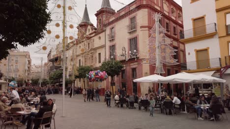 Plaza-del-Salvador-Square-with-Christmas-decorations,-Seville,-Spain,-Tilt-Down