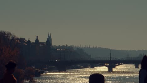 Prague,-October-28,-2019---Prague-bridges-with-Vysehrad-at-the-background-wieh-people-silhouettes