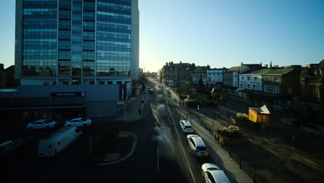 cityscape-of-busy-city-timelapse-of-busy-traffic-buses-cars-from-high-bridge-in-urban-area-of-harrogate
