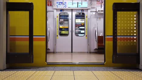 Landscape-view-at-platform-in-the-station-of-Ginza-Subway-Train-Line-in-Tokyo-Japan-without-people-while-door-open-in-slowmotion
