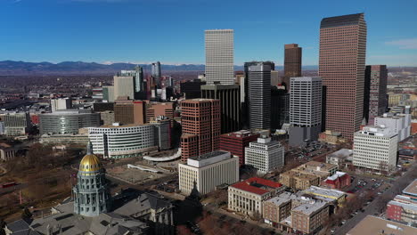 Spinning-aerial-drone-footage-of-downtown-Denver-Colorado-and-the-State-Capitol