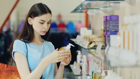 Women-Looks-at-Toiletries-in-a-Store