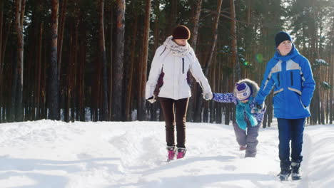 Mother-Walks-With-Her-Two-Children-In-Snow-04