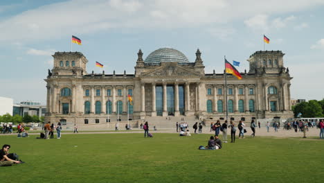 Tourists-Rest-Near-The-Bundestag-In-Berlin