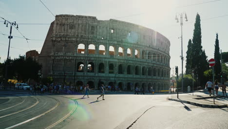 Cars-And-Pedestrians-by-the-Colosseum-Rome
