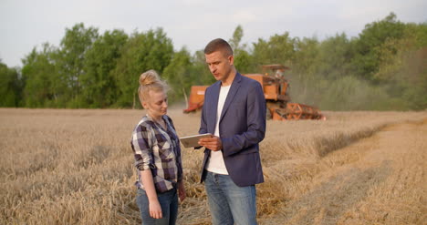 Young-Farmers-Discussing-At-Wheat-Field-23