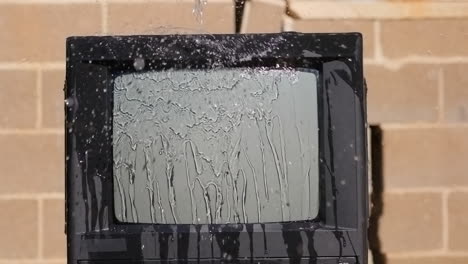 Water-Poured-Over-Old-TV