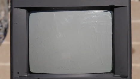 Water-Hits-Old-TV-Screen
