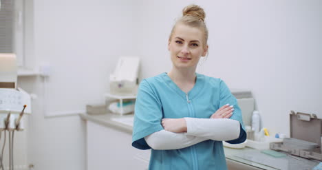 Portrait-Of-Positive-Female-Doctor-At-Clinic-2