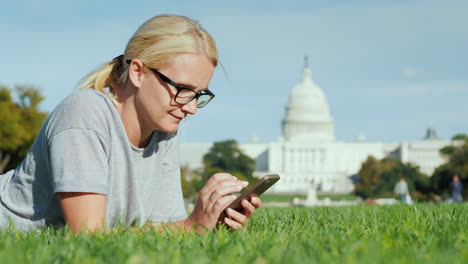 Woman-Using-Smartphone-by-Capitol-Building