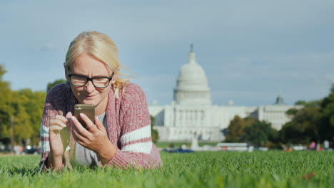 Woman-Using-Phone-by-Capitol-Building