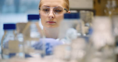 Scientist-Working-In-Laboratory-Microbiology-2