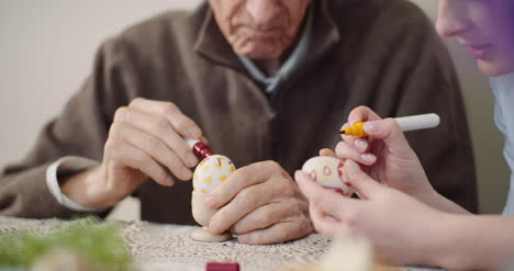 Senior-Man-And-Woman-Painting-Easter-Eggs-6
