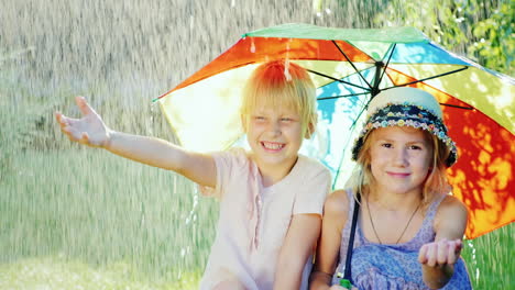 Two-Cheerful-Girlfriends-5-Years-Hiding-From-The-Rain-Under-An-Umbrella-Rainbow-Colors-Happy-Childho