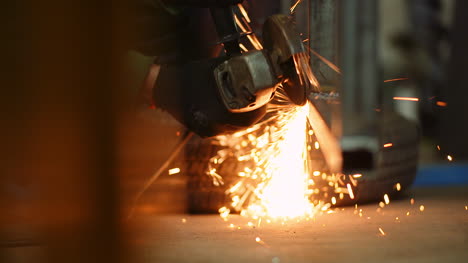 Industry-Worker-Grinding-Metal-With-Angle-Grinder-9