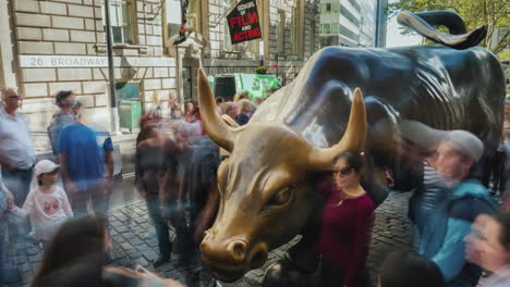 The-Famous-Bronze-Sculpture-Of-The-Bull-On-Wall-Street-Around-Many-People-Trying-To-Take-Pictures-Wi