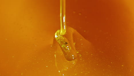 Remove-The-Spoon-From-The-Honey-Pure-Fresh-Honey-Stream-Down-Slow-Motion-Video