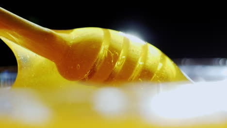 Spoon-With-Honey-In-Backlighting-Hd-Video
