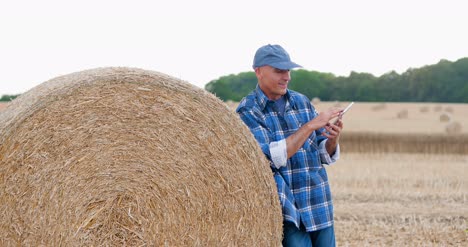 Modern-Farmer-Using-Digital-Tablet-16