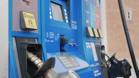 Woman-Pays-For-Refueling-A-Car-With-A-Credit-Card-In-A-Column-At-A-Gas-Station