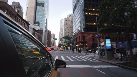 Yellow-New-York-Taxi-Rides-Through-The-Streets-Of-Manhattan