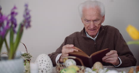 Old-Man-Senior-Man-Reading-Book-