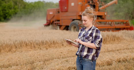 Agriculture-Female-Farmer-Using-Digital-Tablet-At-Harvesting-1