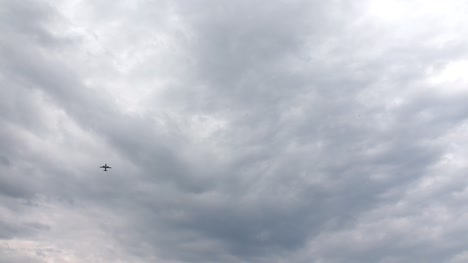 Plane-Or-Airliner-Flying-Against-Clouds