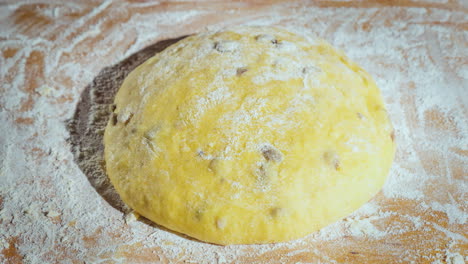 The-Dough-Is-Rising-Dough-With-Raisins-For-Homemade-Baking