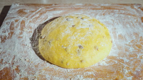 The-Dough-Is-Rising-Dough-With-Raisins-For-Homemade-Baking