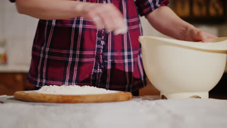A-Woman-Begins-To-Knead-A-Dough-For-Pizza-4K-Video