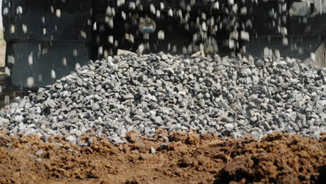 Crushed-Stone-Crumbles-To-The-Ground-From-The-Truck-Body-Delivery-Of-Building-Materials--4K-Video
