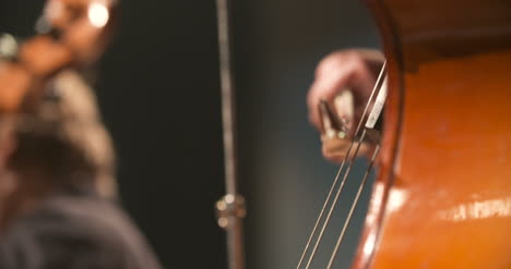 Cello-In-Orchestra-Musician-Playing-Cello