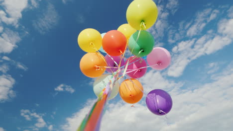 Many-Multi-Colored-Balloons-Aspire-To-The-Sky