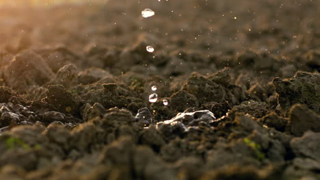 Waterdrops-Falling-On-Soil-Earth-At-Farm-2