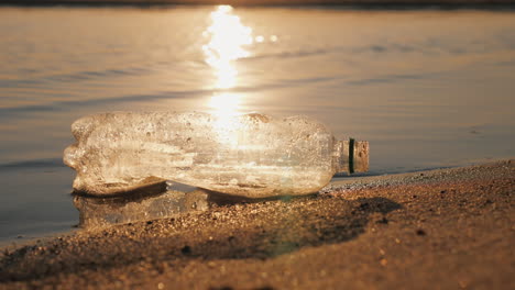Plastic-Trash-On-The-Seashore-The-Bottle-Lies-On-The-Edge-Of-The-Water