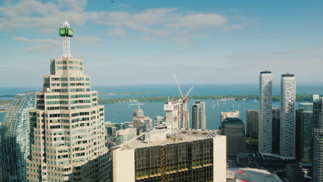 View-From-A-Tall-Building-To-The-City-Of-Toronto-And-The-Bay-Where-Yachts-Swim