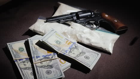 Bullets-Fall-On-Money-And-Drug-Bags
