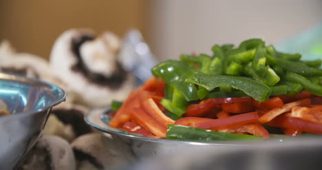 Cut-Green-And-Red-Peppers-In-A-Bowl-1