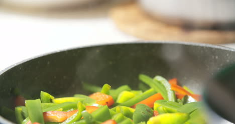 Mixing-Fresh-Vegetables-On-Pan-2
