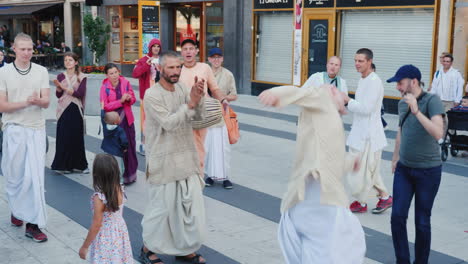 A-Group-Of-Happy-Hare-Krishnas-Dance-And-Sing-In-The-Center-Of-Stockholm