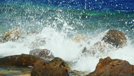 Sea-Waves-Breaking-On-The-Rocks-With-Plenty-Of-Water-Splashing