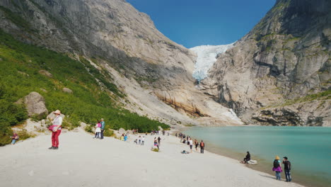 Tourists-From-All-Over-The-World-Visiting-The-Beautiful-Briksdal-Glacier-In-Norway