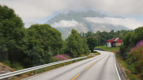 Drive-Along-The-Handsome-Road-Among-The-Mountains-Of-Norway-Pov-View-From-The-Bus-Window