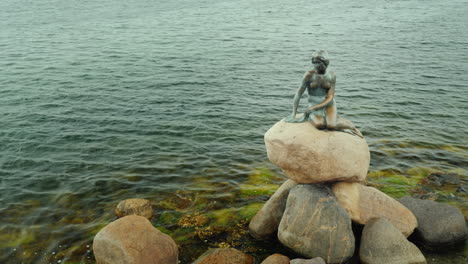 The-Statue-Of-The-Little-Mermaid-Becomes-Wet-Under-The-Rains-In-The-Bay-Of-Copenhagen