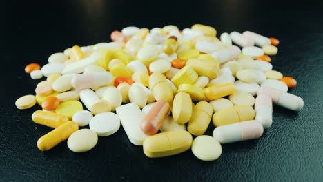 Hands-Move-A-Bunch-Of-Pills-And-Capsules