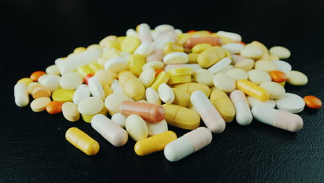 Hands-Move-A-Bunch-Of-Pills-And-Capsules