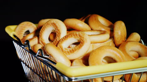 Small-Bagels-In-A-Shopping-Trolley-In-Miniature-4k-Video