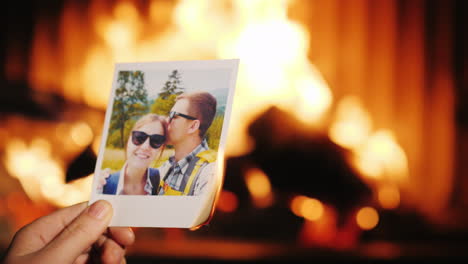 A-Man-Burns-A-Photo-Of-A-Couple-In-Love-And-Throws-It-Into-The-Fireplace